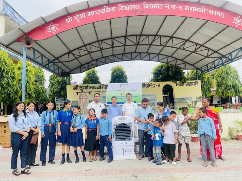 Kamana Sewa Bikas Bank Donates Water Cooler & Braille Paper to Durga Secondary School