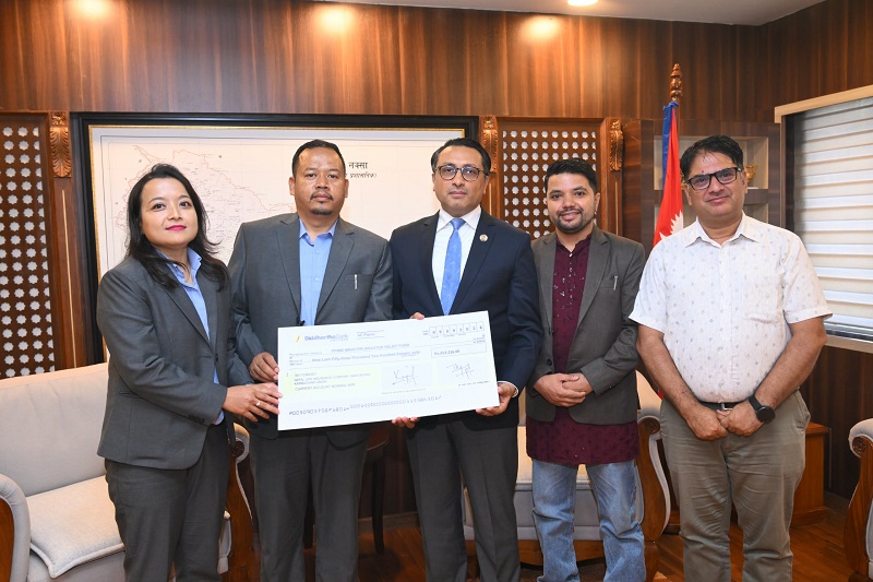 Nepal Life Insurance Employees Contribute NPR 953,216 to Prime Minister Disaster Relief Fund